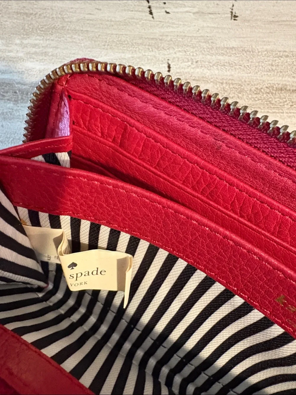 kate spade Red Leather Zip-Around Wallet with Spade Logo